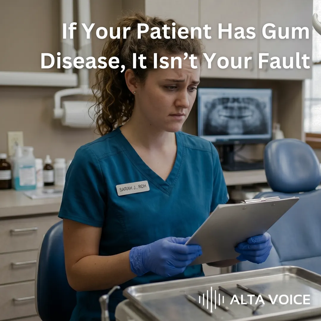 Dental hygienist reviewing a patient's perio chart in the operatory